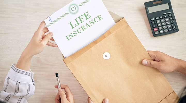 Woman removes document titled Life Insurance from brown envelope and considers whether to get a medical loan
