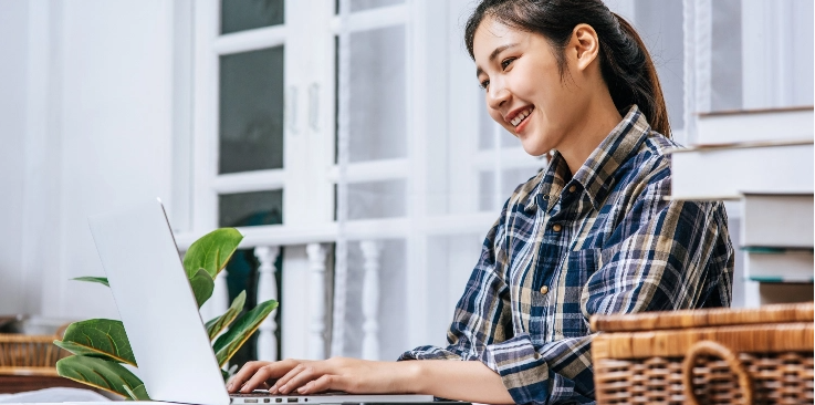 woman happy checking the list of licensed money lender in Singapore