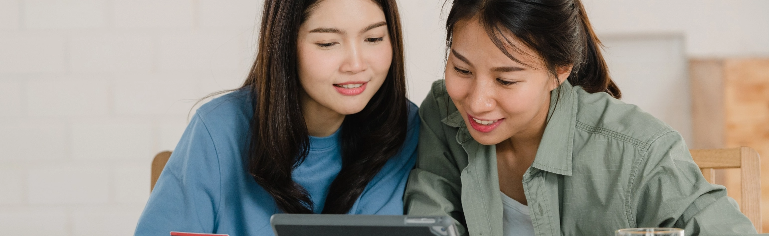 women checking how to engage in money lenders in Singapore